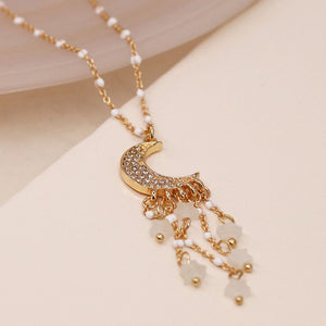 Gold Crystal Moon and Star Drop Necklace
