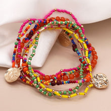 Load image into Gallery viewer, Multistrand Beaded Bracelet with Gold Discs

