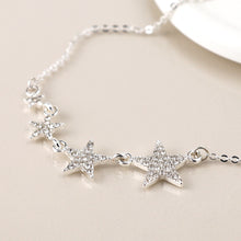 Load image into Gallery viewer, Silver Plated Graduated Crystal Star Necklace
