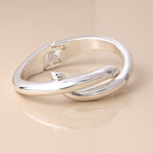 Load image into Gallery viewer, Silver Plated Crossover Hinged Bangle
