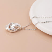 Load image into Gallery viewer, Silver Plated Polished Knot Necklace
