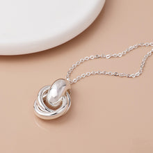Load image into Gallery viewer, Silver Plated Polished Knot Necklace
