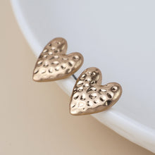 Load image into Gallery viewer, Golden Worn Hammered Heart Earrings
