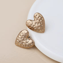 Load image into Gallery viewer, Golden Worn Hammered Heart Earrings

