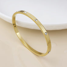 Load image into Gallery viewer, Hinged Gold Plated Stainless Steel Bangle
